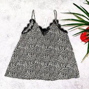 Francesca’s cheetah print and lace trim top